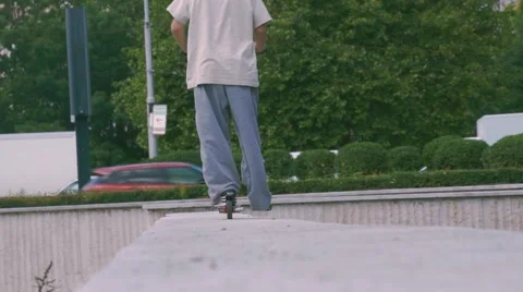 Boy riding scooter Stock Footage 63423911