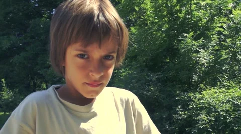 Boy riding scooter Stock Footage 63424863