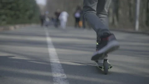 Boy riding a scooter  Video stock 141523770