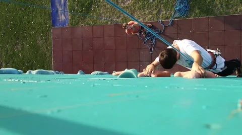 Boy rises to the climbing wall Stock Footage 42638567