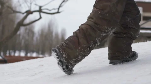 The boy rises on a hill with sleds Stock Footage 102313265