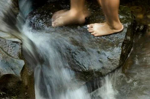 Boy in river Foto stock