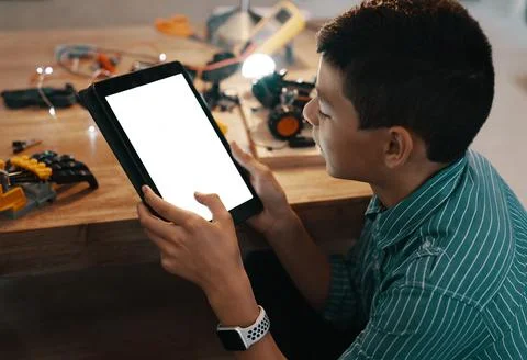 Boy, robotics and engineering with tablet screen for research, design or steps Stock Photos
