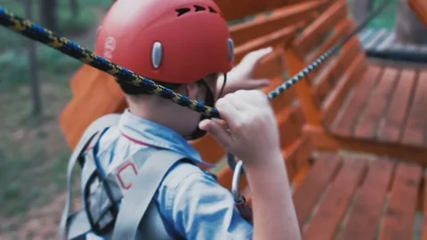 Boy in rope park close-up Stock Footage 73820364
