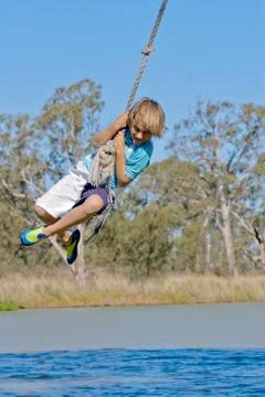 Boy on rope Stock Photos