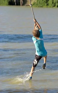 Boy on rope Stock Photos