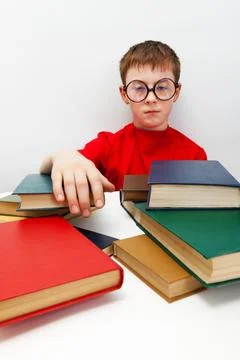 Boy in round glasses Stock Photos