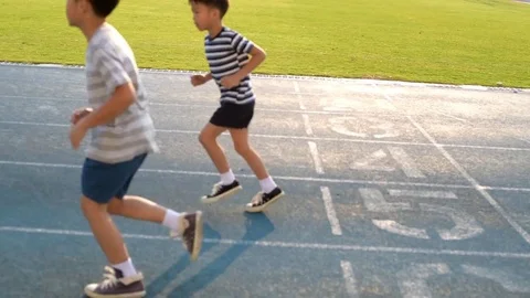 Boy run and cheating pull Stock Footage 72882821