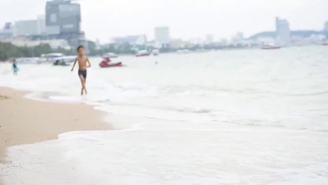 Boy run on the beach  Stock Footage 70272489