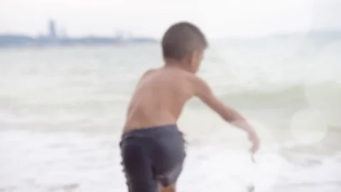 Boy run plan on the beach Stock-Footage 72882741
