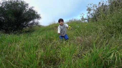 Boy run in the wild Stock Footage 61086719