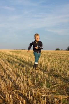 Boy is runing Stock Photos