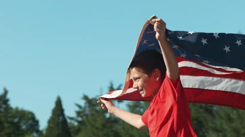 Boy running with American flag, shot on Phantom Flex 4K Stock Footage