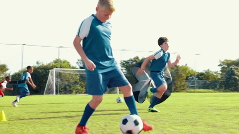 Boy, running and soccer practice on field with parachute, strength training and Stock Footage 309417003