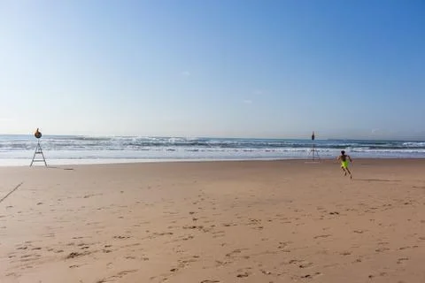 Boy Running Beach Ocean Stock Photos