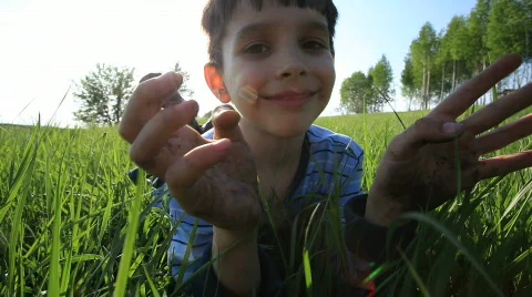 Boy running on green grass Stock-Footage 746976
