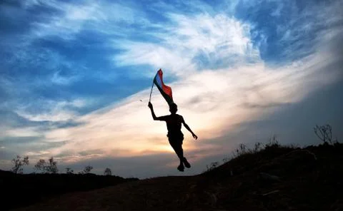 Boy running with indian flag Stock Photos