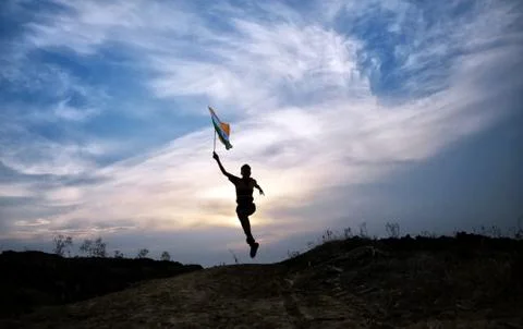 Boy running with indian flag Stock Photos