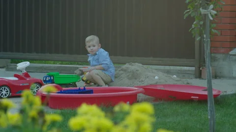 Boy Running to the Mother from the Playground Stock Footage 56260373