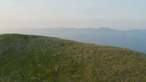 Boy Running in The Mountains. Stock Footage 109278933