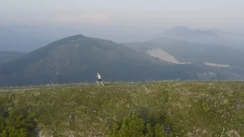 Boy Running in The Mountains. Stock Footage 109278957