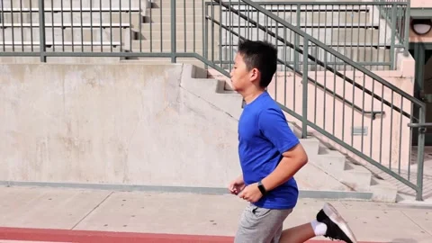 Boy Running On School Track 動画素材 249417401