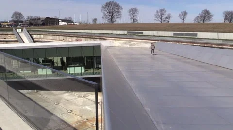 Boy runs down the slope to the Danish Maritime Museum in Elsinore / Helsingør Видео 49233038