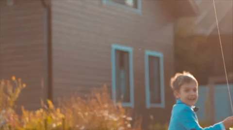 Boy Runs With a Kite Stock Footage 68926593