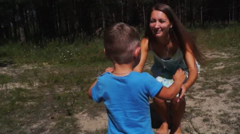 Boy runs to mother Stock Footage 54660630