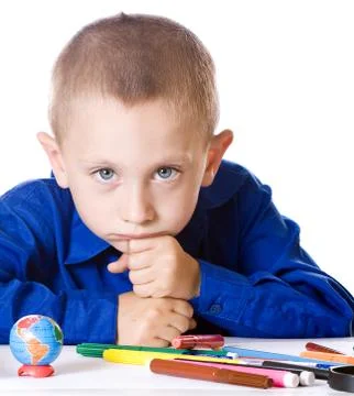 The boy is sad thinking about school Stock Photos