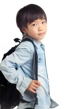 Boy with school bag Stock Photos