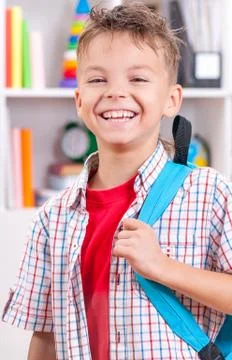 Boy with school bag Stock Photos