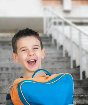 Boy with schoolbag Stock Photos