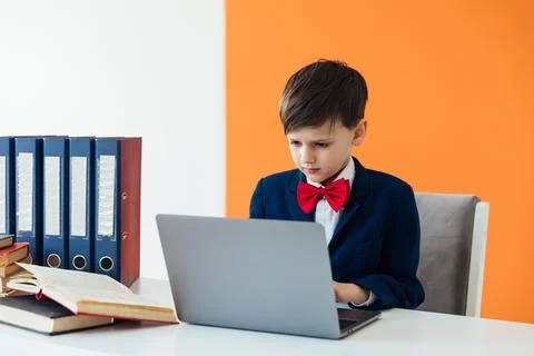Boy schoolboy studying at the computer online education lessons Foto stock