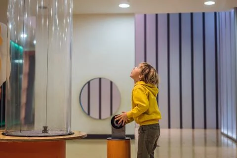 Boy in science class. The child is engaged in science Stock Photos