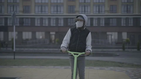 Boy on scooter  Video stock 141611163