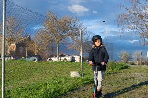 The boy on the scooter Foto stock