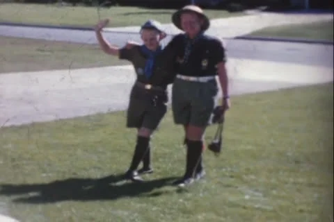 Boy Scout Brothers getting in car   1950's Stock Footage 24740055