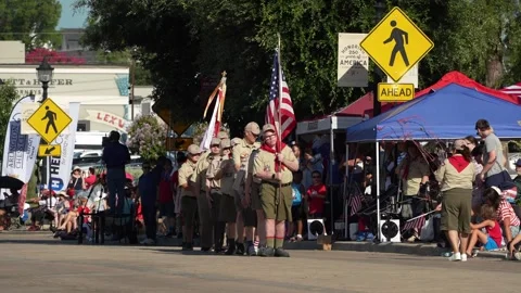 Boy Scout color guard marching in parade 動画素材 340940796