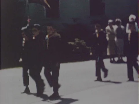Boy Scouts marching down street in parade - Vintage 8mm Stock Footage 79065727