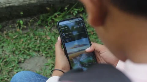A boy scrolling facebook Stock Footage 233759274