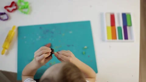 The boy sculpts from plasticine Stock Footage 220418804
