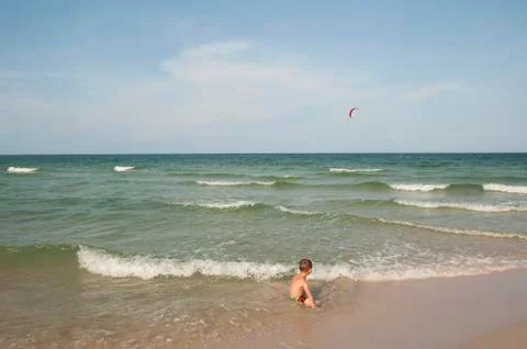 Boy on the sea Stock Photos
