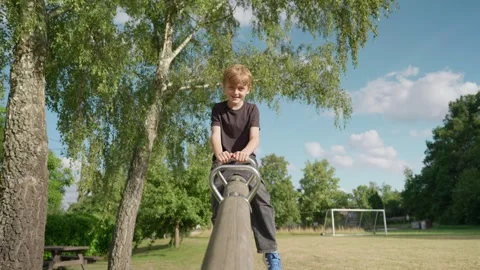 A Boy on a Seesaw Video stock 345710723