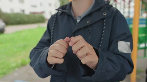 Boy sharpens skills through outdoor activities. Young student diligently Stock Footage 338287138