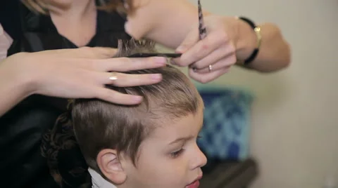 Boy shearing scissors Stock Footage 63333102