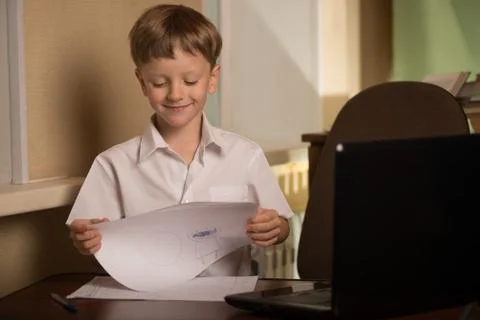 Boy a sheet of paper Stock Photos