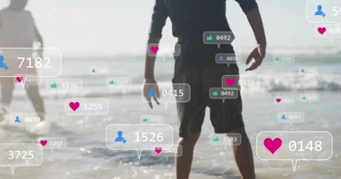 Boy shifting stance on shore, camera pulling back, heart icons and counts Stock Footage 330462901