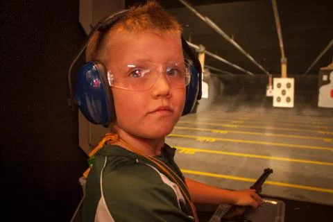 Boy at the Shooting Range Stock Photos