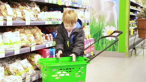 The boy is shopping Stock Footage 166364660